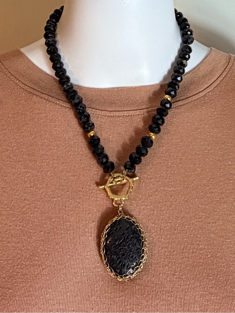 Black Faceted Bead Necklace Gold Tone Oval Statement Pendant